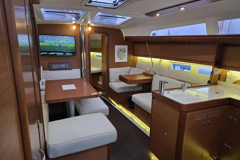  Yacht Photos Pics Luxurious interior of 2019 Dufour Grand Large 412 Grand Prix yacht with modern amenities.