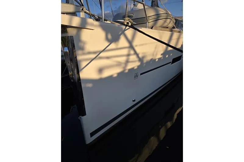  Yacht Photos Pics 2019 Dufour Grand Large 412 Grand Prix yacht side view in marina.