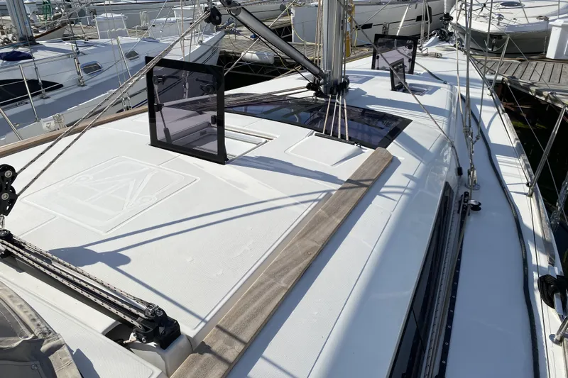  Yacht Photos Pics 2019 Dufour Grand Large 412 Grand Prix sailboat deck with rigging and hatches.