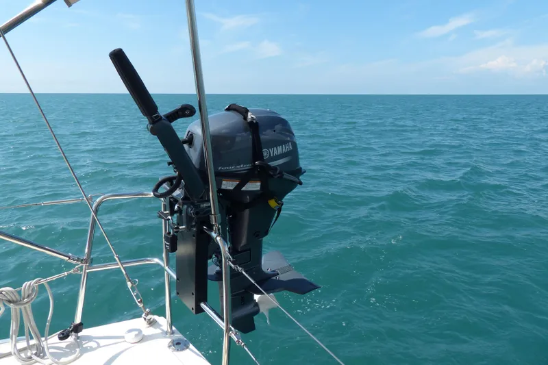  Yacht Photos Pics 2019 Dufour Grand Large 412 sailboat with Yamaha outboard motor on open sea.