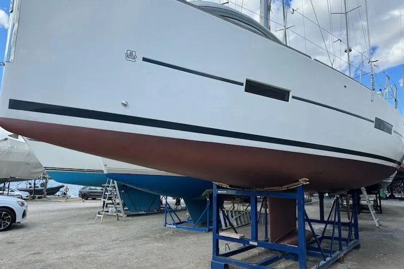  Yacht Photos Pics 2019 Dufour Grand Large 412 Grand Prix sailboat on dry dock, side view.
