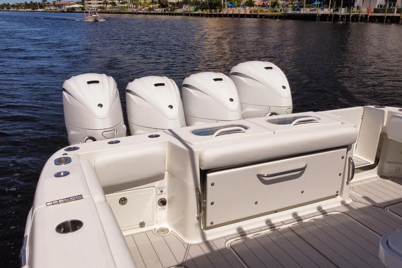  Yacht Photos Pics 2020 HCB 42 Siesta boat with four powerful outboard engines on a sunny day.
