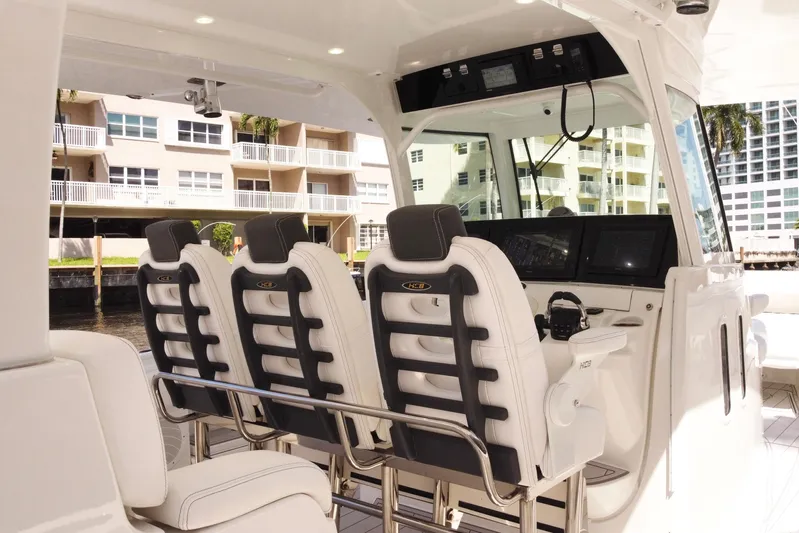  Yacht Photos Pics 2020 HCB 42 Siesta boat interior with luxury seating and modern dashboard.