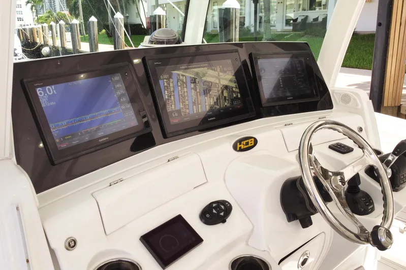  Yacht Photos Pics Helm of 2020 HCB 42 Siesta with advanced navigation displays and controls.