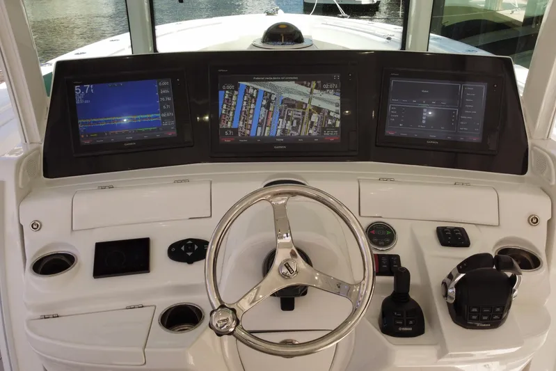  Yacht Photos Pics Helm of 2020 HCB 42 Siesta boat with advanced navigation displays.