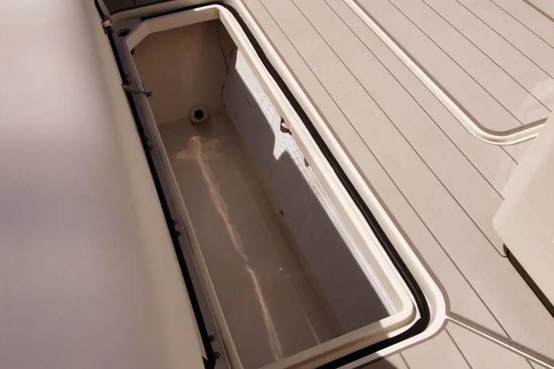  Yacht Photos Pics Open storage compartment on 2020 HCB 42 Siesta boat deck.