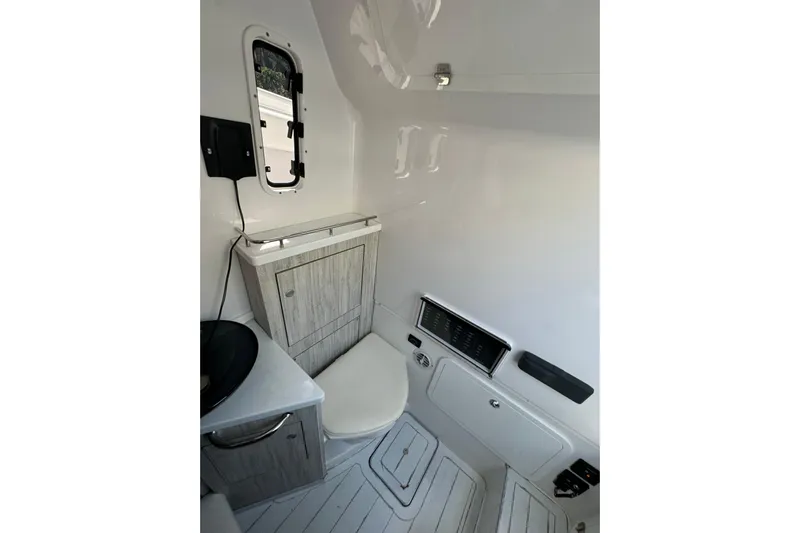  Yacht Photos Pics 2020 HCB 42 Siesta boat interior bathroom with modern fixtures and compact design.