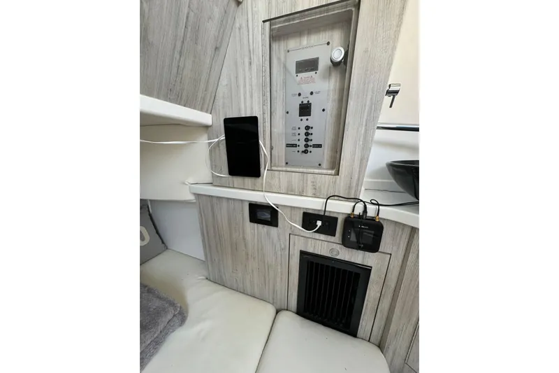  Yacht Photos Pics Interior of 2020 HCB 42 Siesta boat with control panel and charging devices.