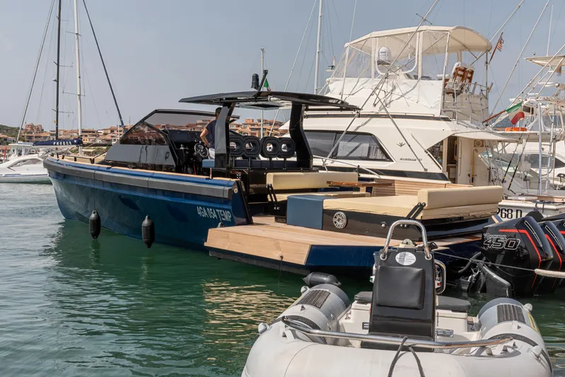  Yacht Photos Pics Seanfinity T4 2021 luxury yacht docked in marina, featuring sleek design and spacious deck.