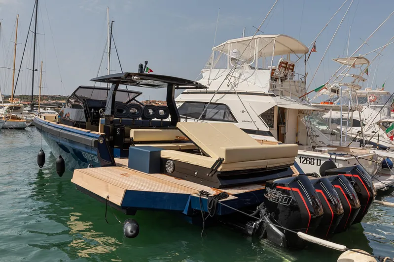  Yacht Photos Pics Luxury Seanfinity T4 2021 boat docked, featuring sleek design and powerful engines.