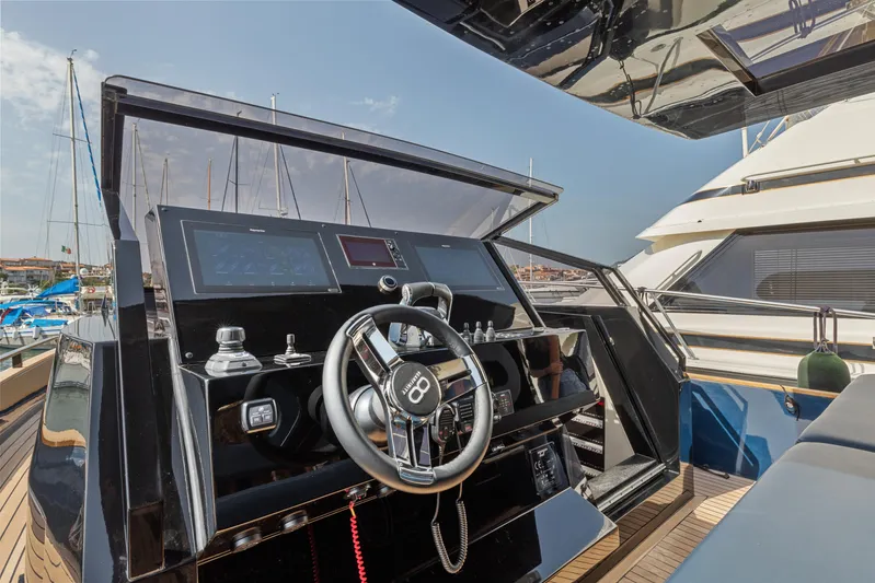  Yacht Photos Pics Helm of 2021 Seanfinity T4 yacht with modern controls and steering wheel.