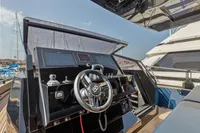 Helm of 2021 Seanfinity T4 yacht with modern controls and steering wheel.