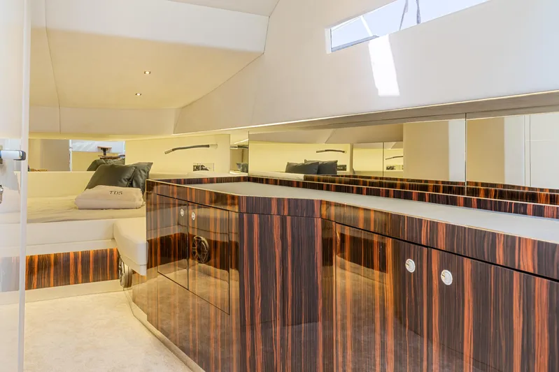  Yacht Photos Pics Luxurious interior of 2021 Seanfinity T4 yacht with modern wood finish and cozy seating area.