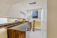 Luxurious interior of 2021 Seanfinity T4 yacht with modern design and elegant wood finishes.