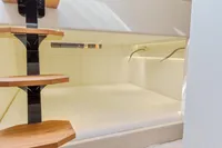 Luxurious interior cabin of 2021 Seanfinity T4 yacht with modern wooden steps.