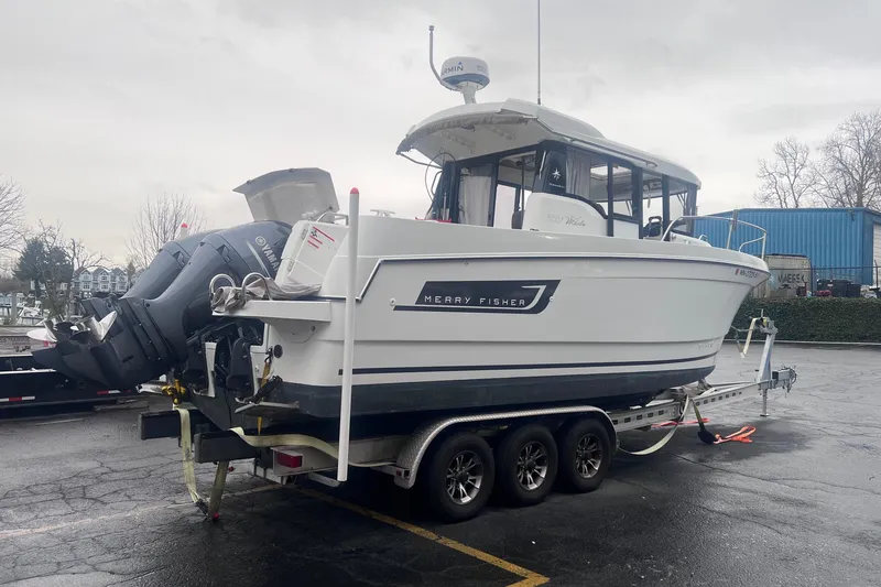  Yacht Photos Pics 2015 Jeanneau Merry Fisher 855 Marlin on trailer, featuring Yamaha outboard motor.