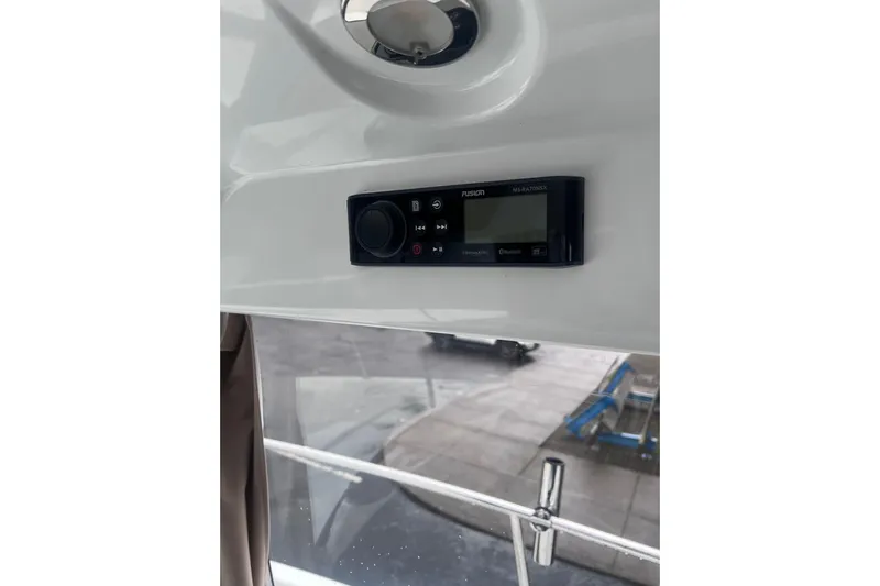  Yacht Photos Pics Fusion stereo system inside 2015 Jeanneau Merry Fisher 855 Marlin boat.