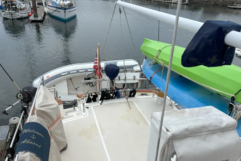 Slainte Yacht Photos Pics Selene 40 Archer yacht, 2006 model, docked with kayaks and dinghy on deck.