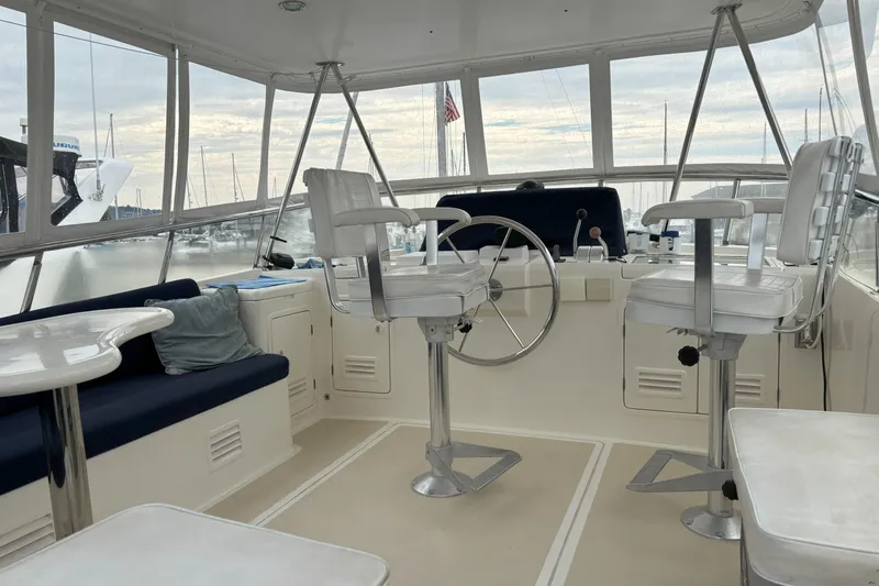 Slainte Yacht Photos Pics Interior of 2006 Selene 40 Archer yacht with helm and seating area.