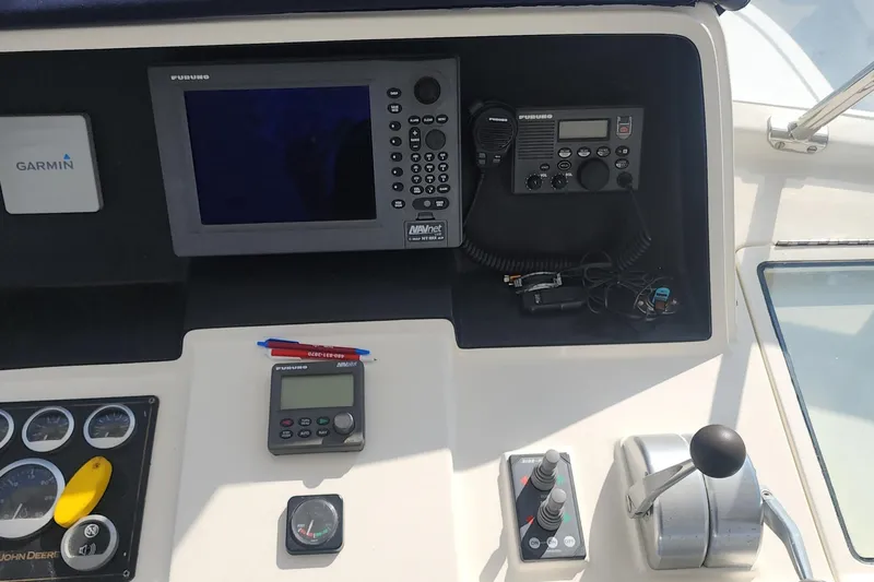 Slainte Yacht Photos Pics Control panel of a 2006 Selene 40 Archer yacht with navigation equipment.