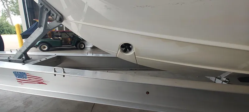  Yacht Photos Pics 2020 Pursuit S 368 Sport boat on trailer with American flag decal.