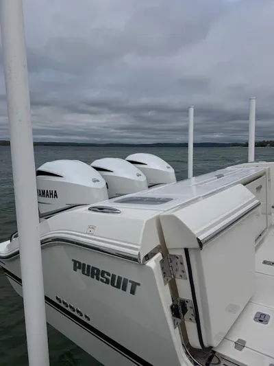  Yacht Photos Pics 2020 Pursuit S 368 Sport boat with Yamaha engines on a cloudy day.