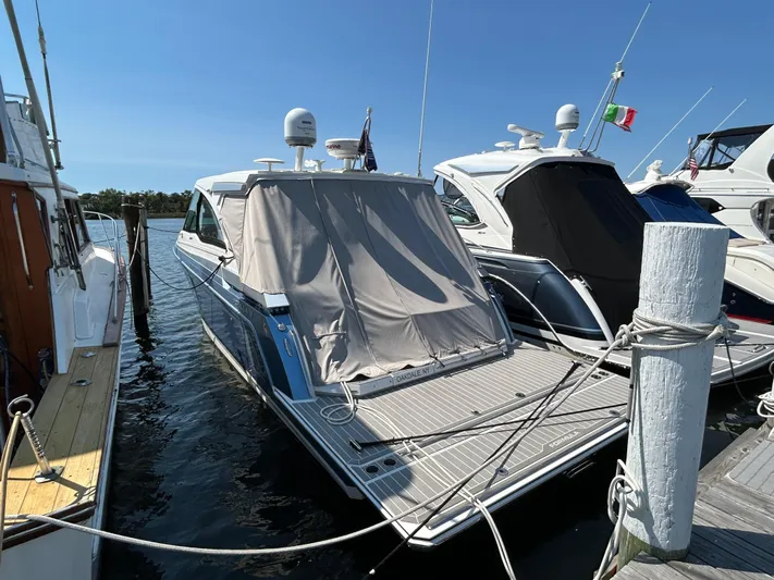  Yacht Photos Pics 2020 Formula 380 Super Sport Crossover docked at marina, rear view.