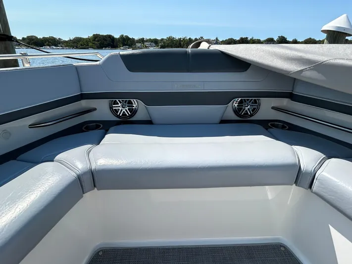  Yacht Photos Pics 2020 Formula 380 Super Sport Crossover boat interior with cushioned seating and speakers.