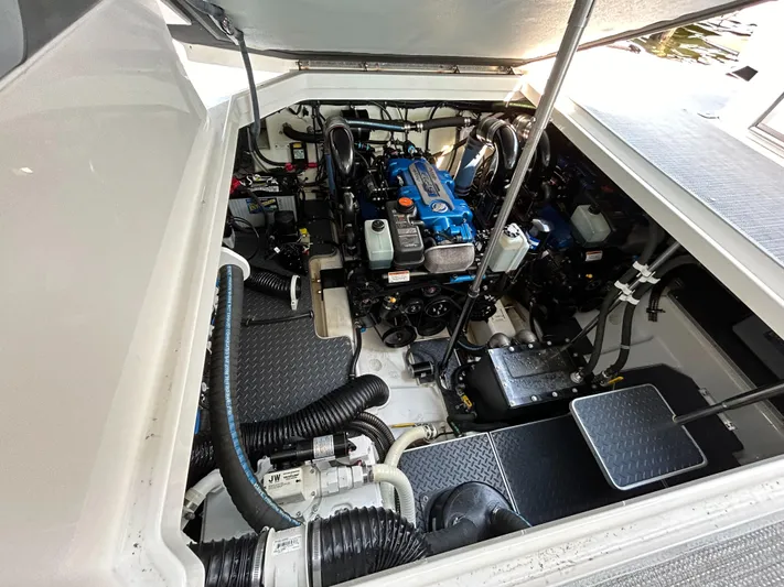  Yacht Photos Pics Engine compartment of 2020 Formula 380 Super Sport Crossover boat, showcasing detailed mechanics.