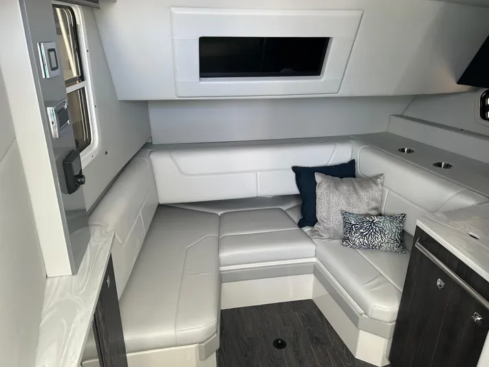  Yacht Photos Pics 2020 Formula 380 Super Sport Crossover cabin with modern seating and cushions.