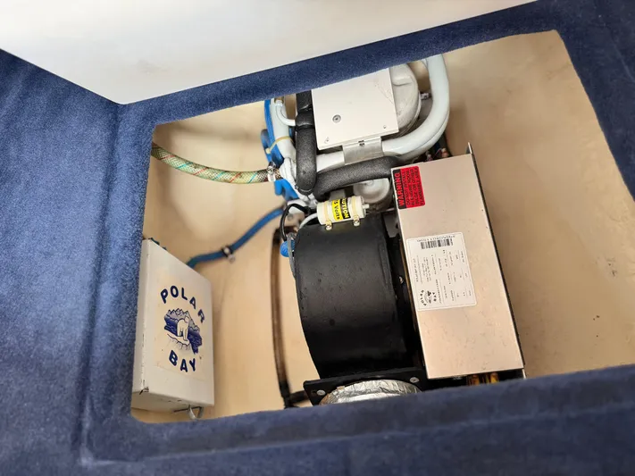  Yacht Photos Pics 2004 Donzi 38 ZX engine compartment with Polar Bay air conditioning unit.