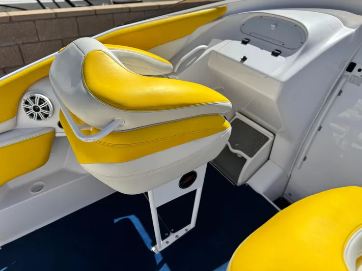 Yacht Photos Pics 2004 Donzi 38 ZX boat interior with yellow and white seating and modern design.