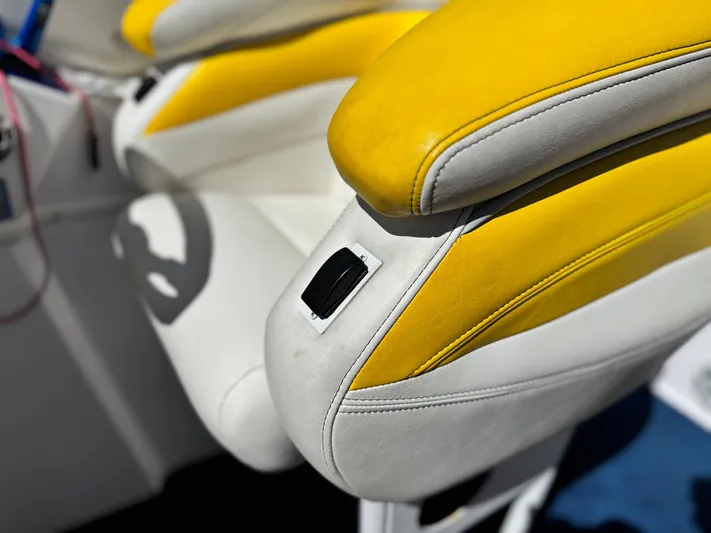  Yacht Photos Pics Yellow and white seat detail of a 2004 Donzi 38 ZX boat.