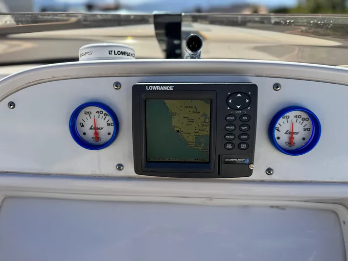  Yacht Photos Pics Dashboard of a 2004 Donzi 38 ZX boat featuring a Lowrance GPS system.