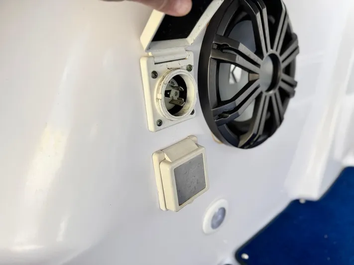  Yacht Photos Pics 2004 Donzi 38 ZX boat speaker and electrical outlet on white surface.