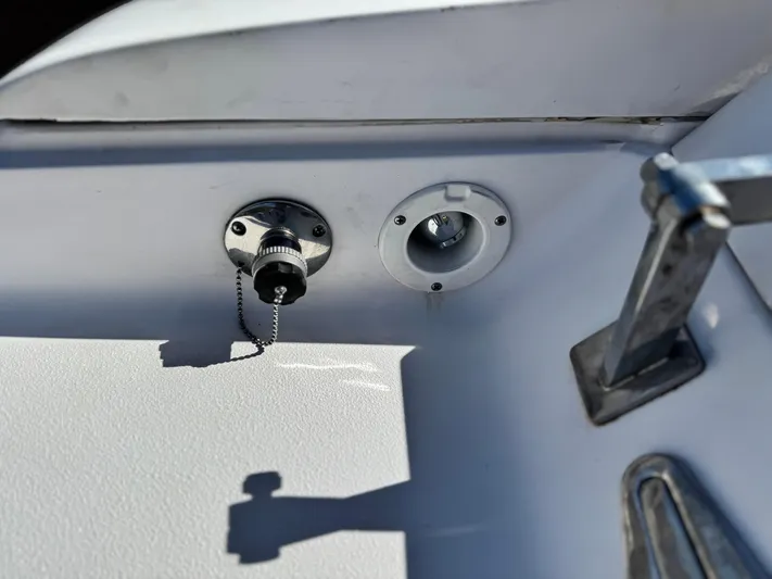 Yacht Photos Pics 2004 Donzi 38 ZX boat detail showing a fuel cap and metal fixture.