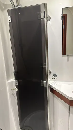  Yacht Photos Pics Shower area in 2013 Beneteau Oceanis 50 yacht bathroom with sleek design.