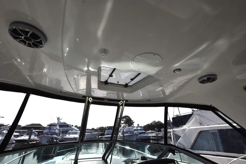 Dauntless Yacht Photos Pics Interior view of 2017 Monterey 355 Sport Yacht with ceiling speakers and hatch.