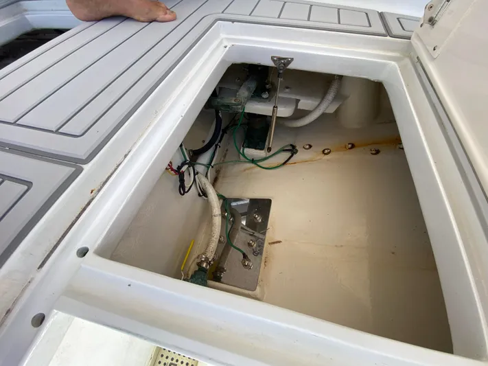  Yacht Photos Pics Open hatch on 1995 L&H 33 boat showing internal wiring and components.