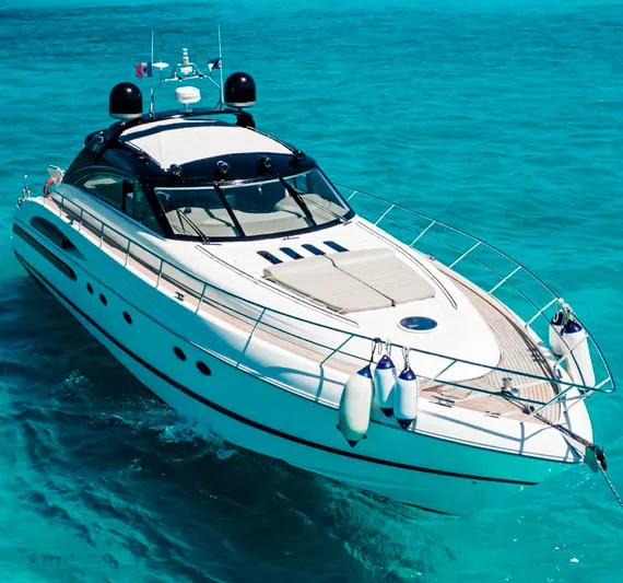 2004 Princess 65 @ Cancun Incentive Yacht Photos Pics Luxury 2004 Princess 65 yacht cruising on clear turquoise waters.