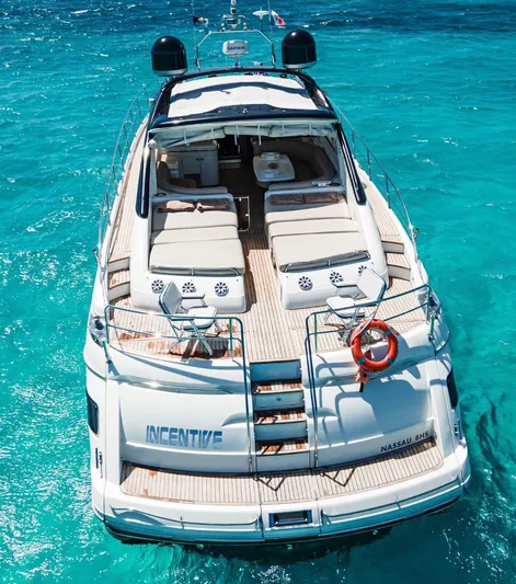 2004 Princess 65 @ Cancun Incentive Yacht Photos Pics Luxury Princess 65 yacht, 2004 model, cruising in clear turquoise waters.