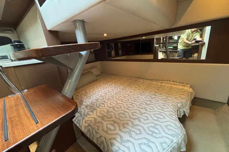  Yacht Photos Pics Interior cabin of 2016 Sea Ray 350 Sundancer with cozy bed and modern design.