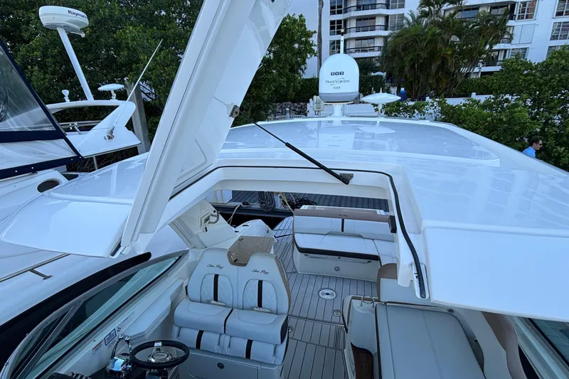  Yacht Photos Pics 2016 Sea Ray 350 Sundancer yacht with open sunroof and luxurious seating.