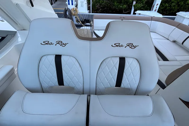  Yacht Photos Pics Luxury seating on 2016 Sea Ray 350 Sundancer boat, featuring elegant white upholstery.