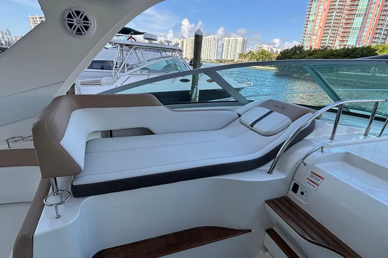 Yacht Photos Pics 2016 Sea Ray 350 Sundancer boat interior with luxurious seating and waterfront view.