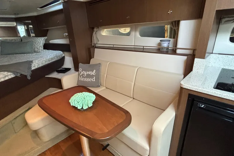  Yacht Photos Pics Interior of 2016 Sea Ray 350 Sundancer with cozy seating and modern amenities.