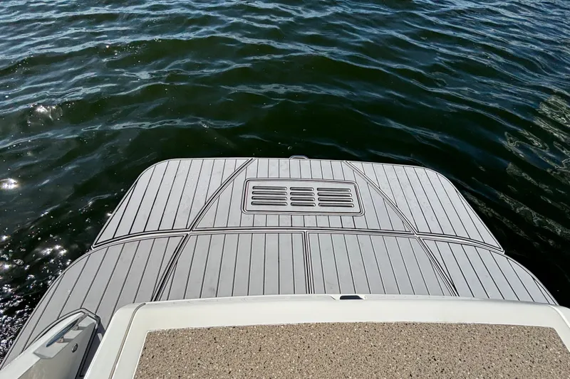  Yacht Photos Pics 2016 Sea Ray 350 Sundancer swim platform on calm water.