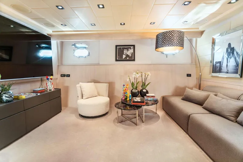  Yacht Photos Pics Luxurious interior of 2004 Mangusta 130 yacht with modern decor and elegant furnishings.