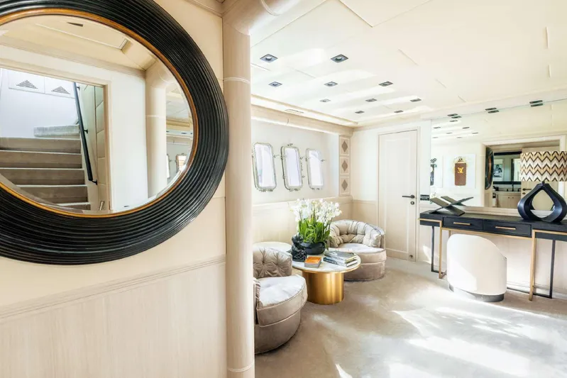  Yacht Photos Pics Luxurious interior of 2004 Mangusta 130 yacht with elegant decor and modern furnishings.