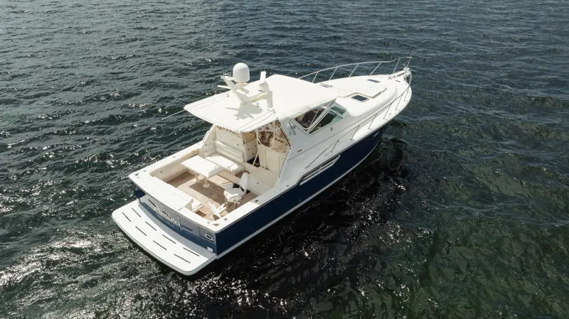  Yacht Photos Pics 1998 Tiara Yachts 4300 Open cruising on open water, aerial view.